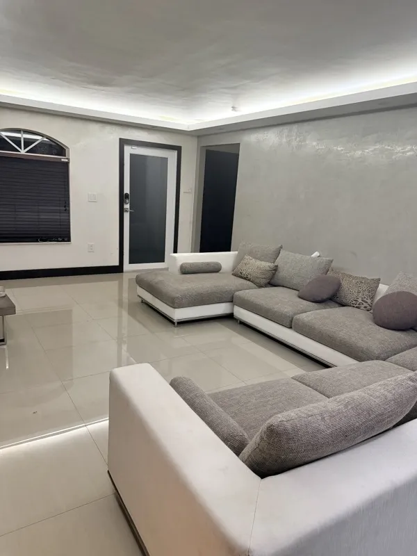 Bodied in MIA suite living area with soft natural light